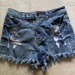 Sneak peek distressed hi waisted shorts